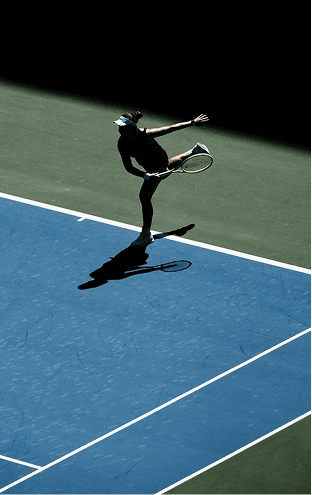 A tennis serve at full stretch